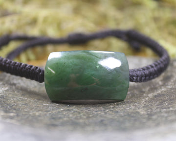 Adjustable cord bracelet with Hapopo Pounamu