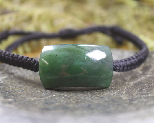 Adjustable cord bracelet with Hapopo Pounamu