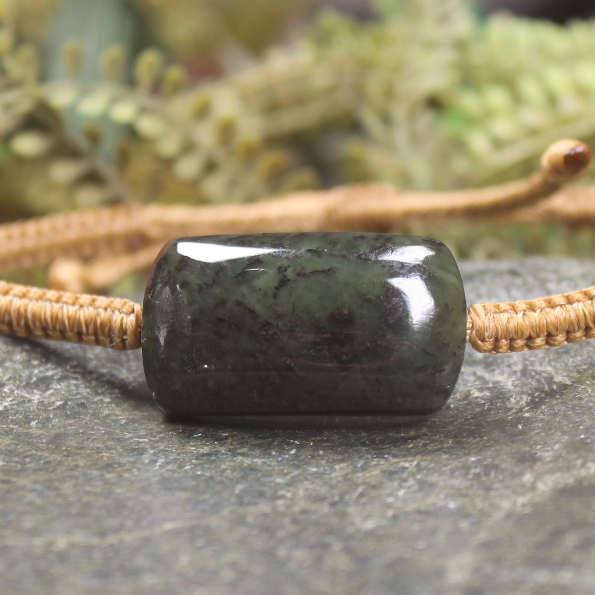 Adjustable cord bracelet with Rimu Pounamu