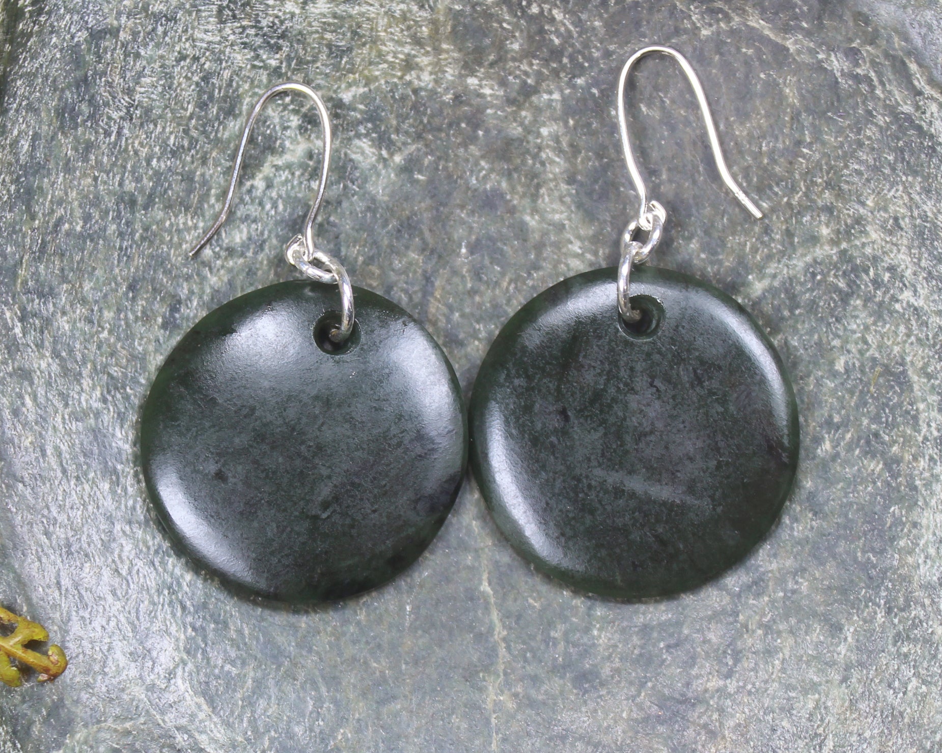 Porowhita Earrings carved from Kawakawa Pounamu - NZ Greenstone