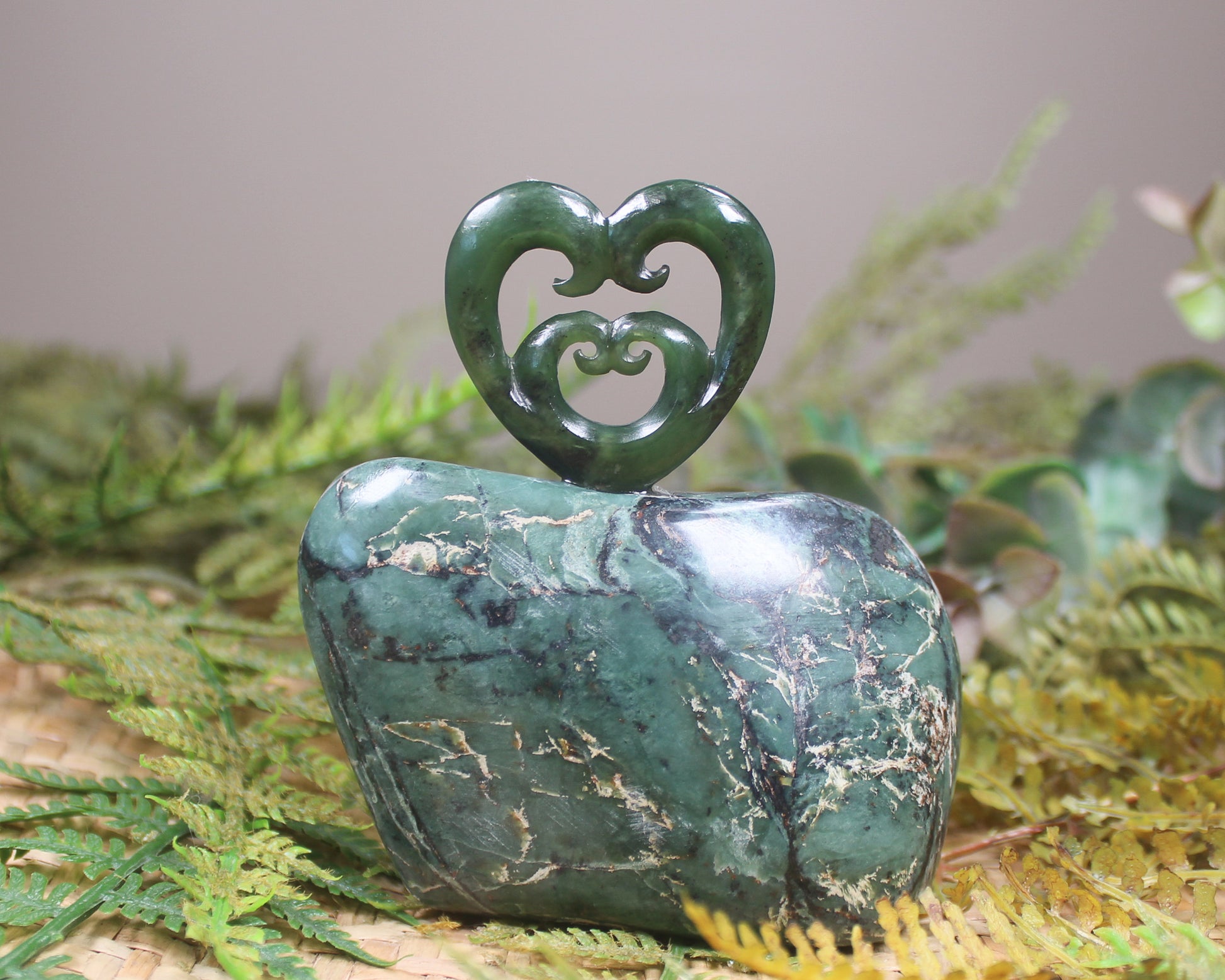 Koru heart sculpture carved from Hapopo Pounamu - NZ Greenstone