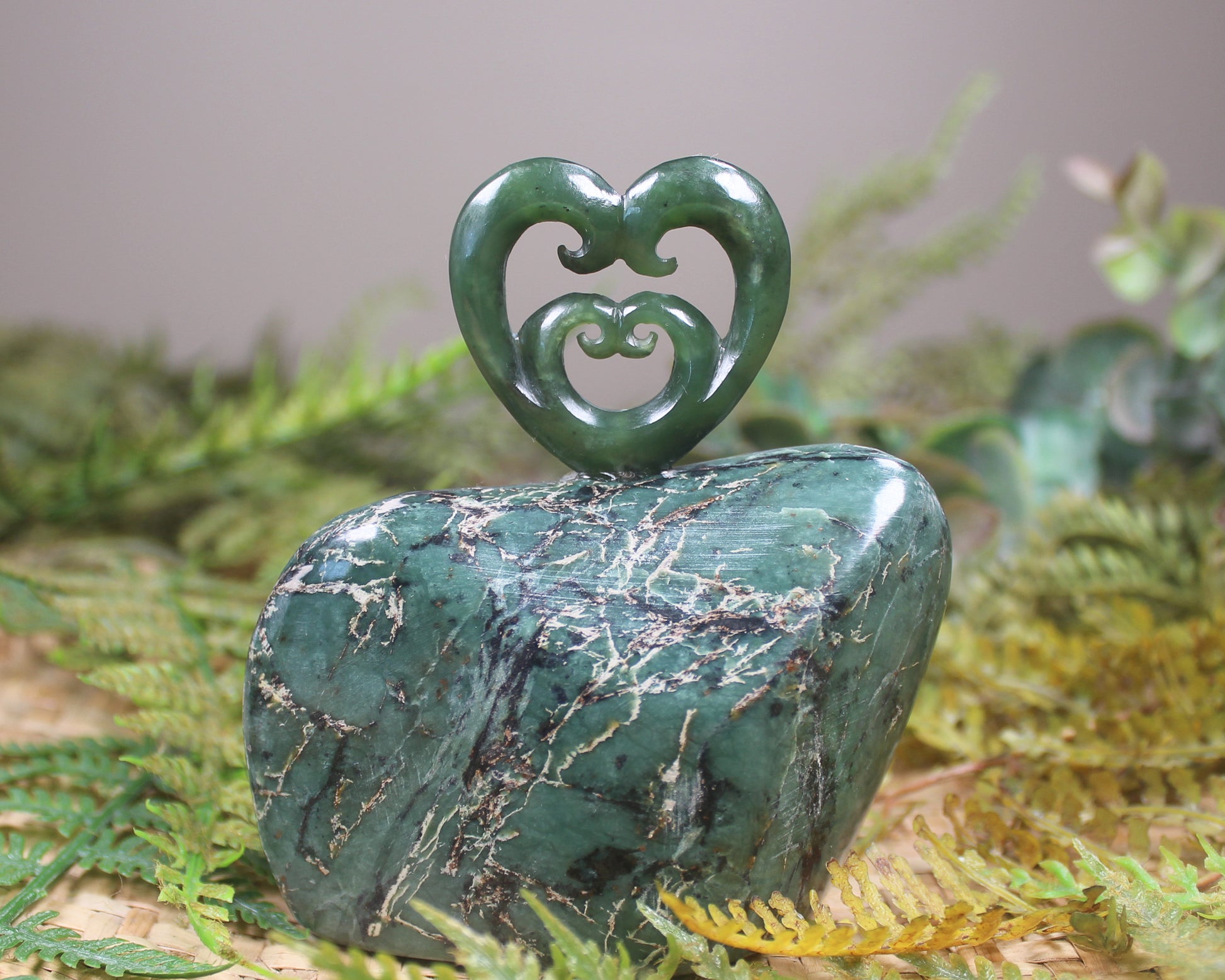 Koru heart sculpture carved from Hapopo Pounamu - NZ Greenstone