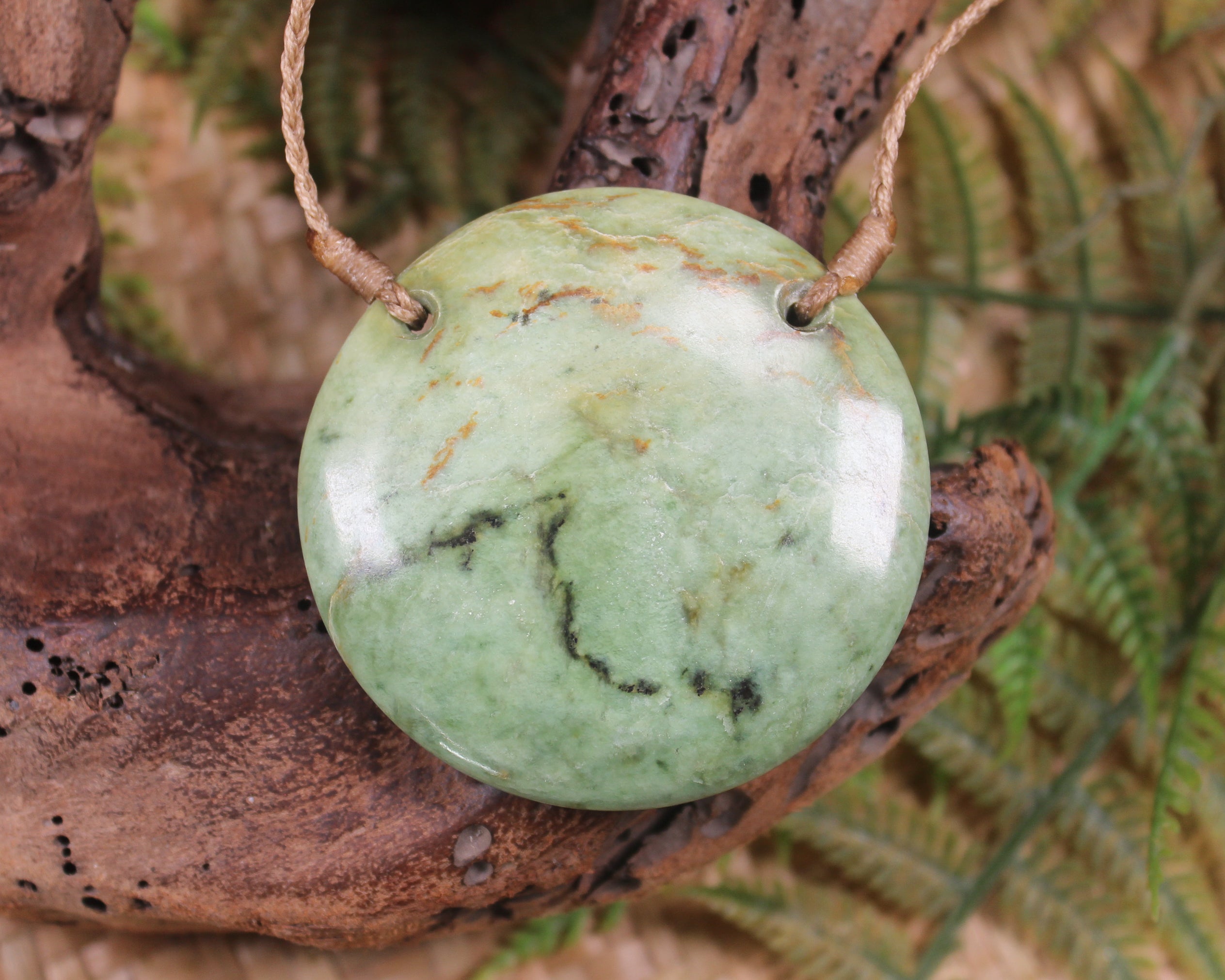 Porowhita carved from Flower Jade Pounamu - NZ Greenstone