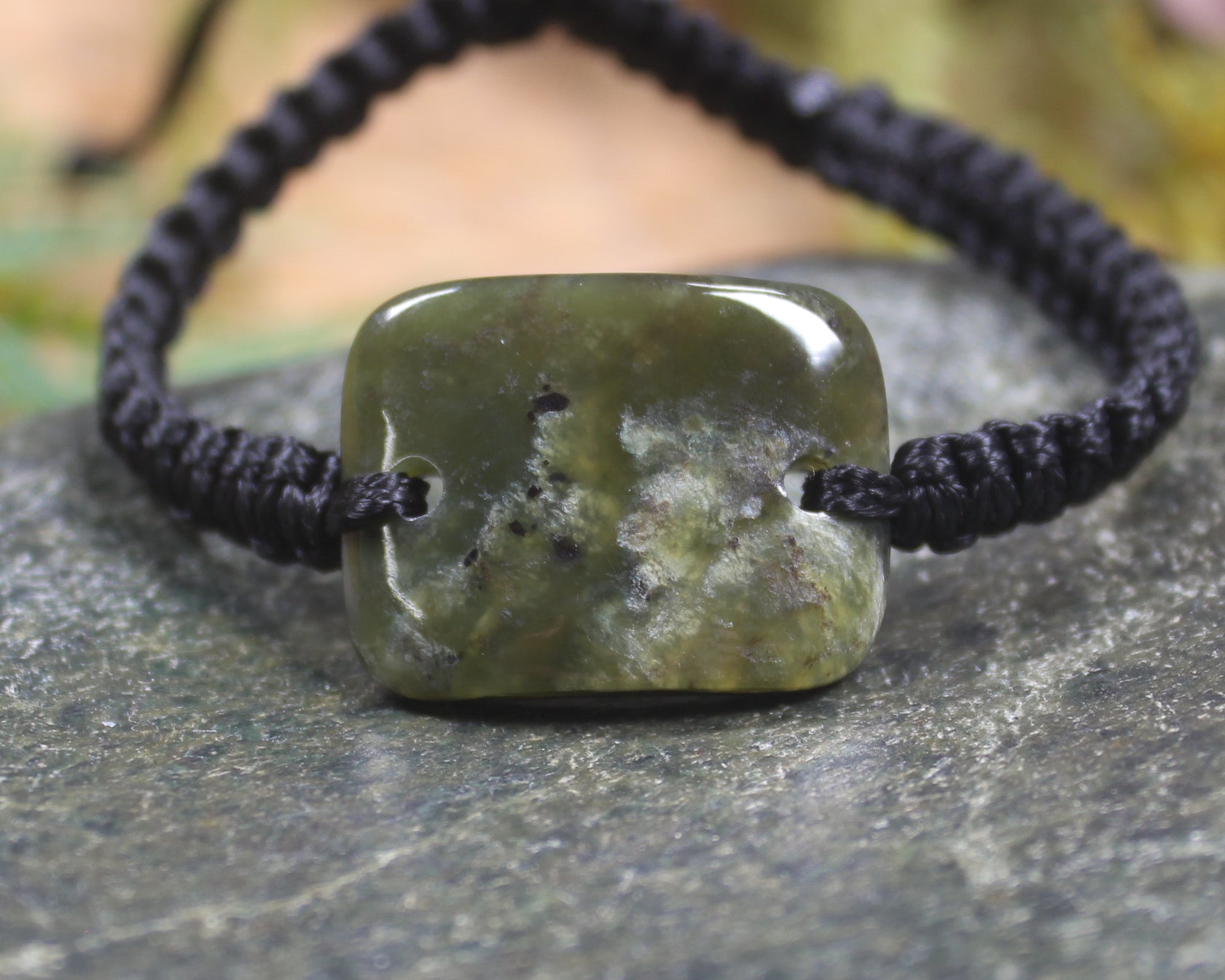 Adjustable cord bracelet with Rimu Pounamu