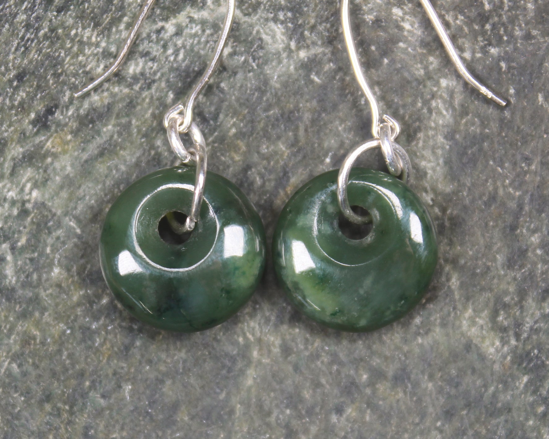 Porowhita Earrings carved from Kawakawa Pounamu - NZ Greenstone