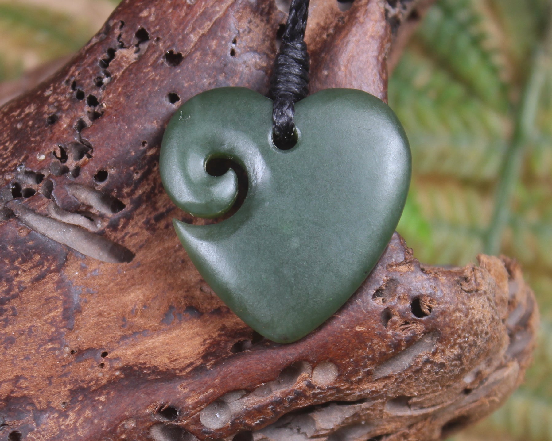 Heart with Koru carved from Kawakawa Pounamu - NZ Greenstone