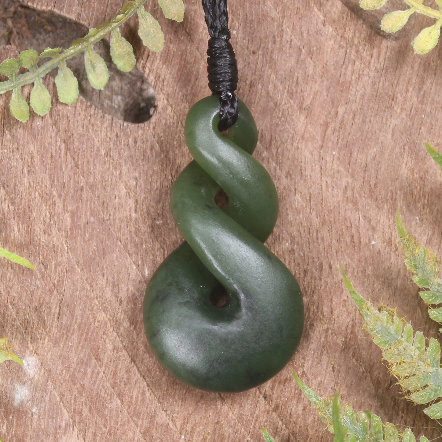 Twist or Pikorua carved from Hapopo Pounamu - NZ Greenstone