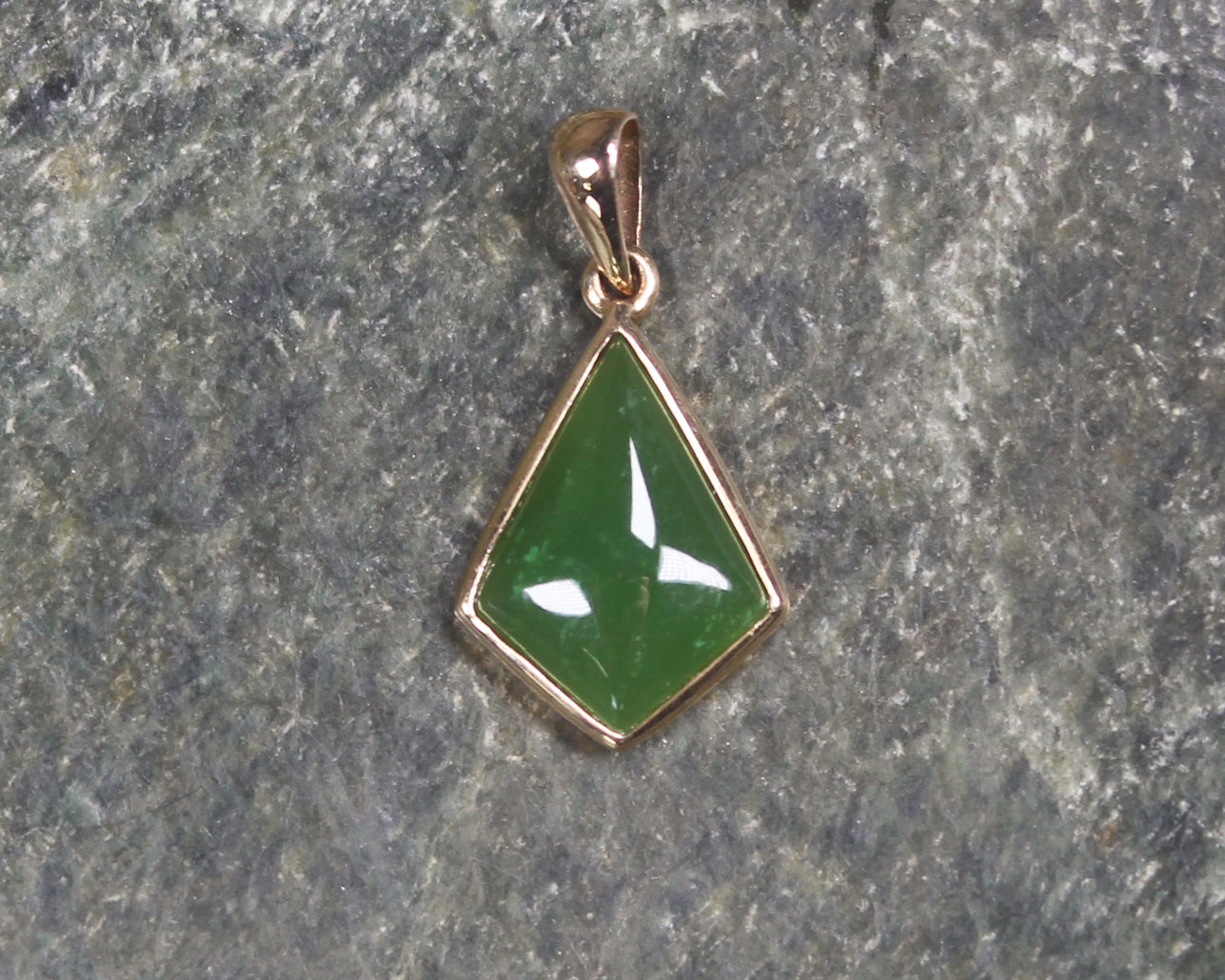 Kawakawa Pounamu pendant with a gold plated setting - NZ Greenstone