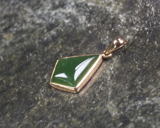 Kawakawa Pounamu pendant with a gold plated setting - NZ Greenstone