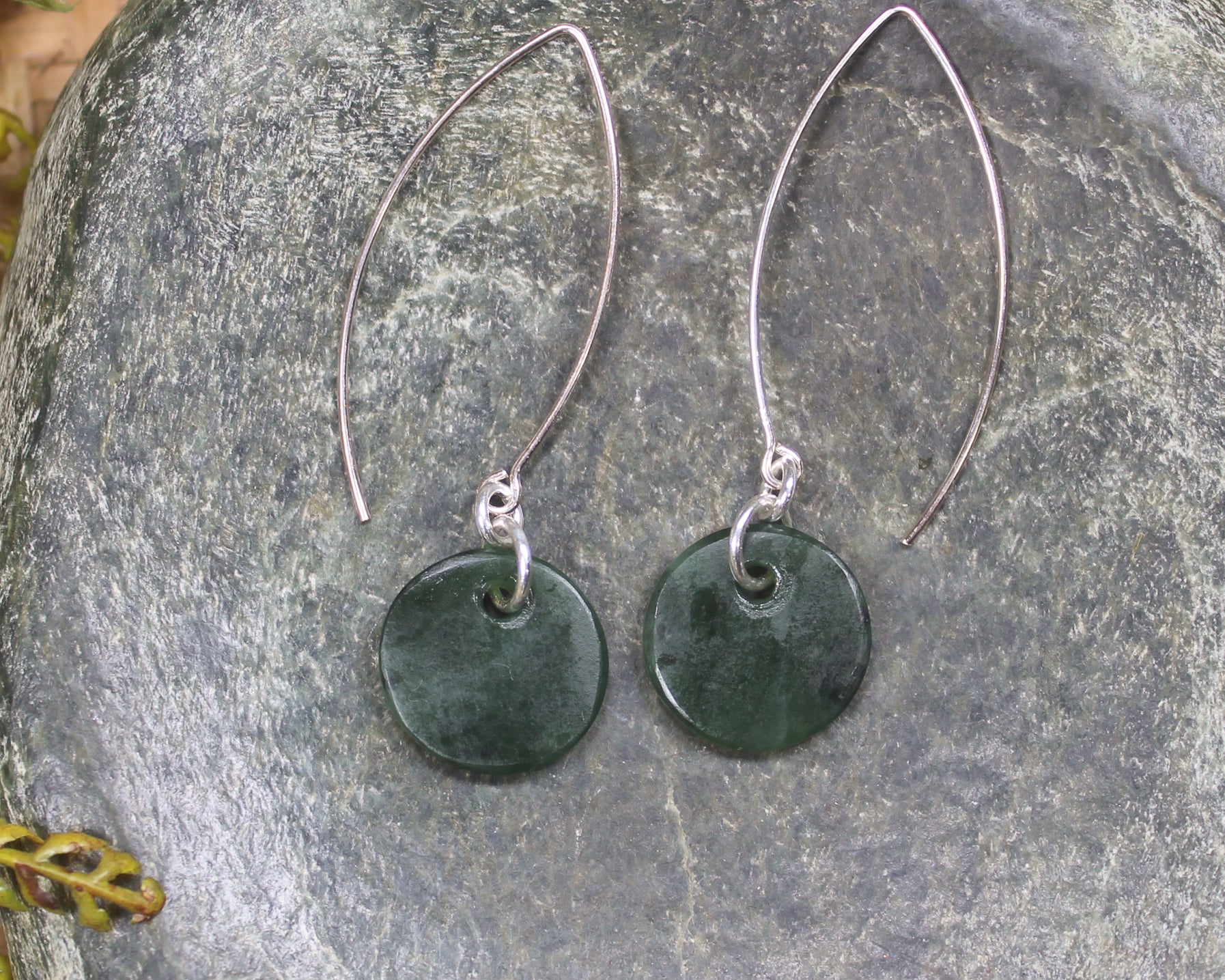 Porowhita Earrings carved from Kawakawa Pounamu - NZ Greenstone
