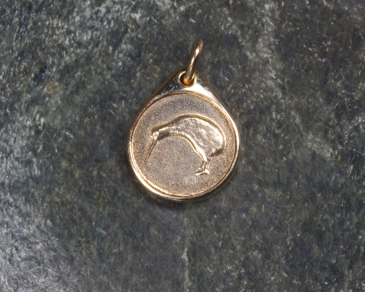 Hapopo Pounamu pendant with a gold setting - NZ Greenstone