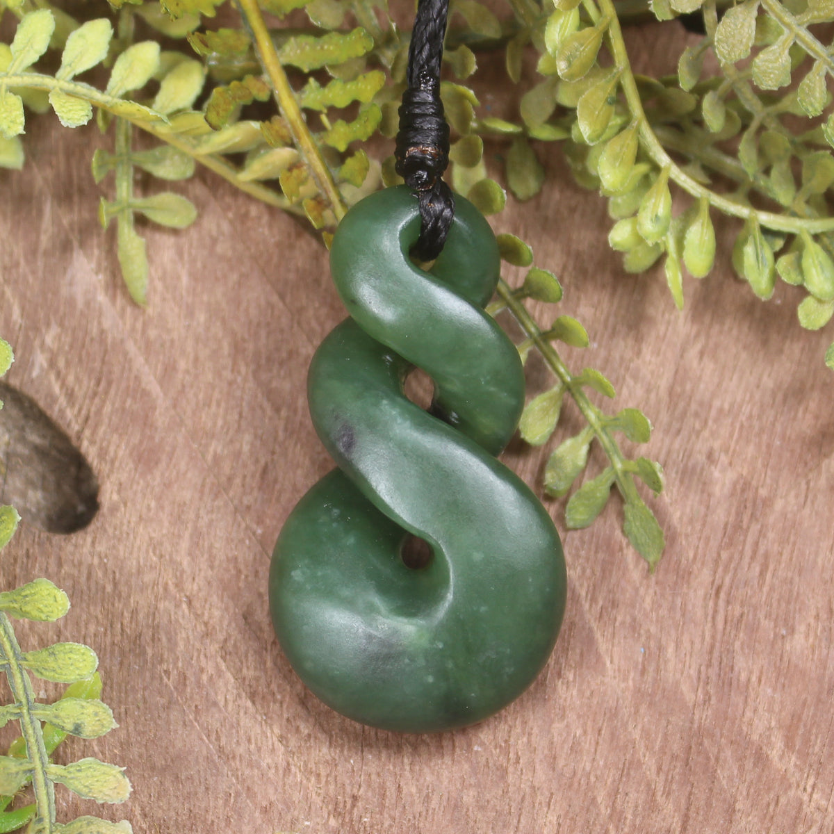 Twist or Pikorua carved from Hapopo Pounamu - NZ Greenstone