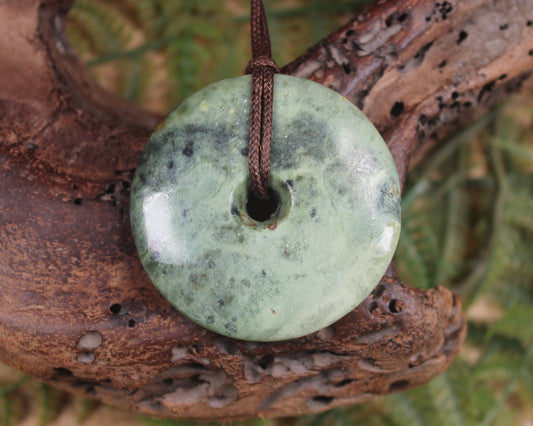 Porowhita carved from Rimu Pounamu - NZ Greenstone