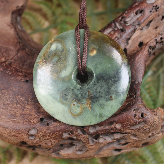 Porowhita carved from Rimu Pounamu - NZ Greenstone