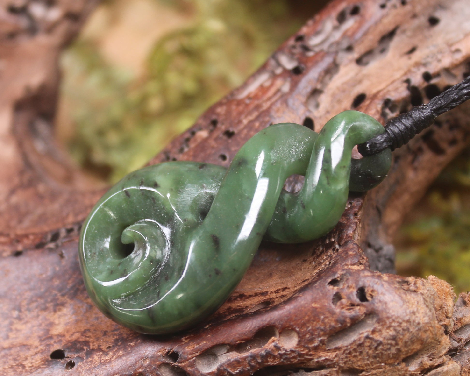Hapopo Pounamu Koru Twist pendant - NZ Greenstone