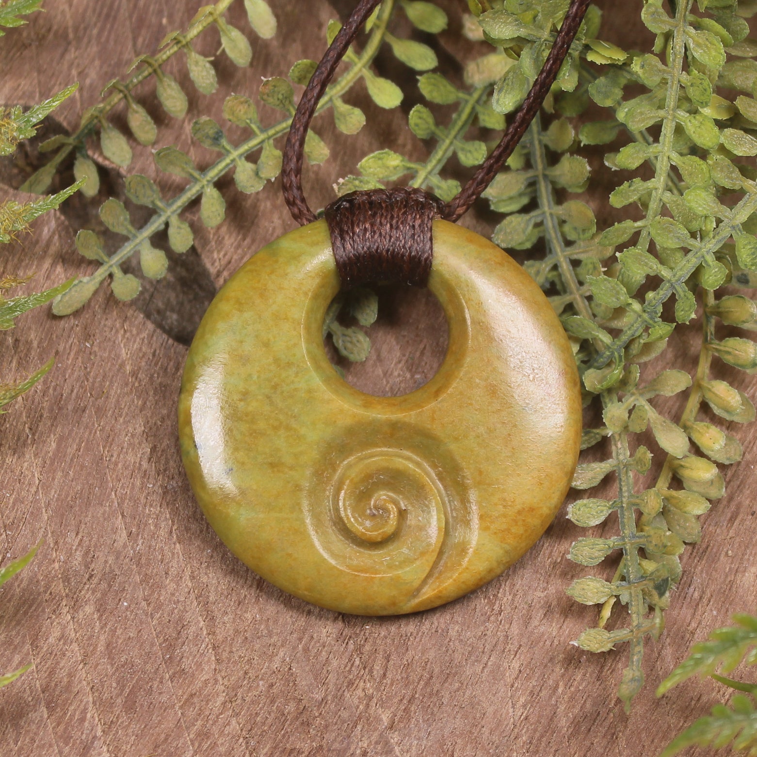 Porowhita with Koru carved from Flower Jade Pounamu - NZ Greenstone