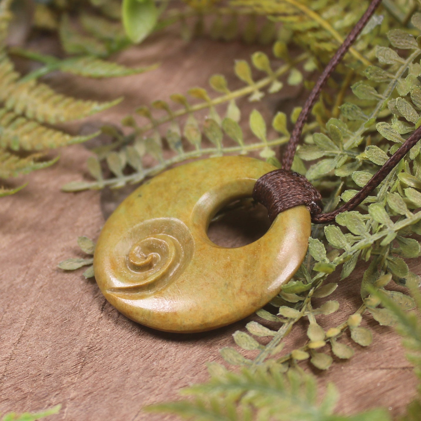 Porowhita with Koru carved from Flower Jade Pounamu - NZ Greenstone
