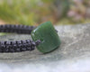 Adjustable cord bracelet with Kawakawa Pounamu