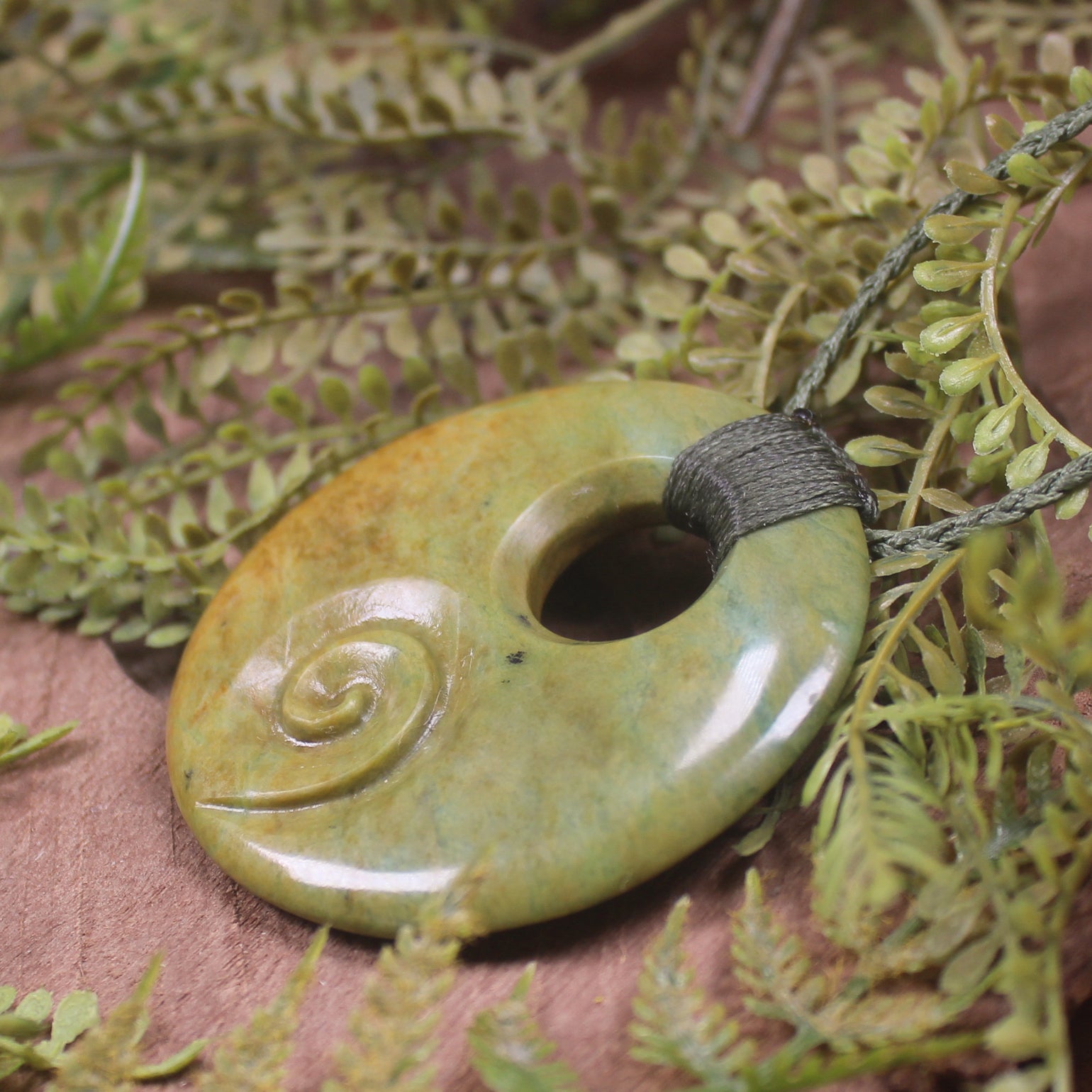 Porowhita with Koru carved from Flower Jade Pounamu - NZ Greenstone