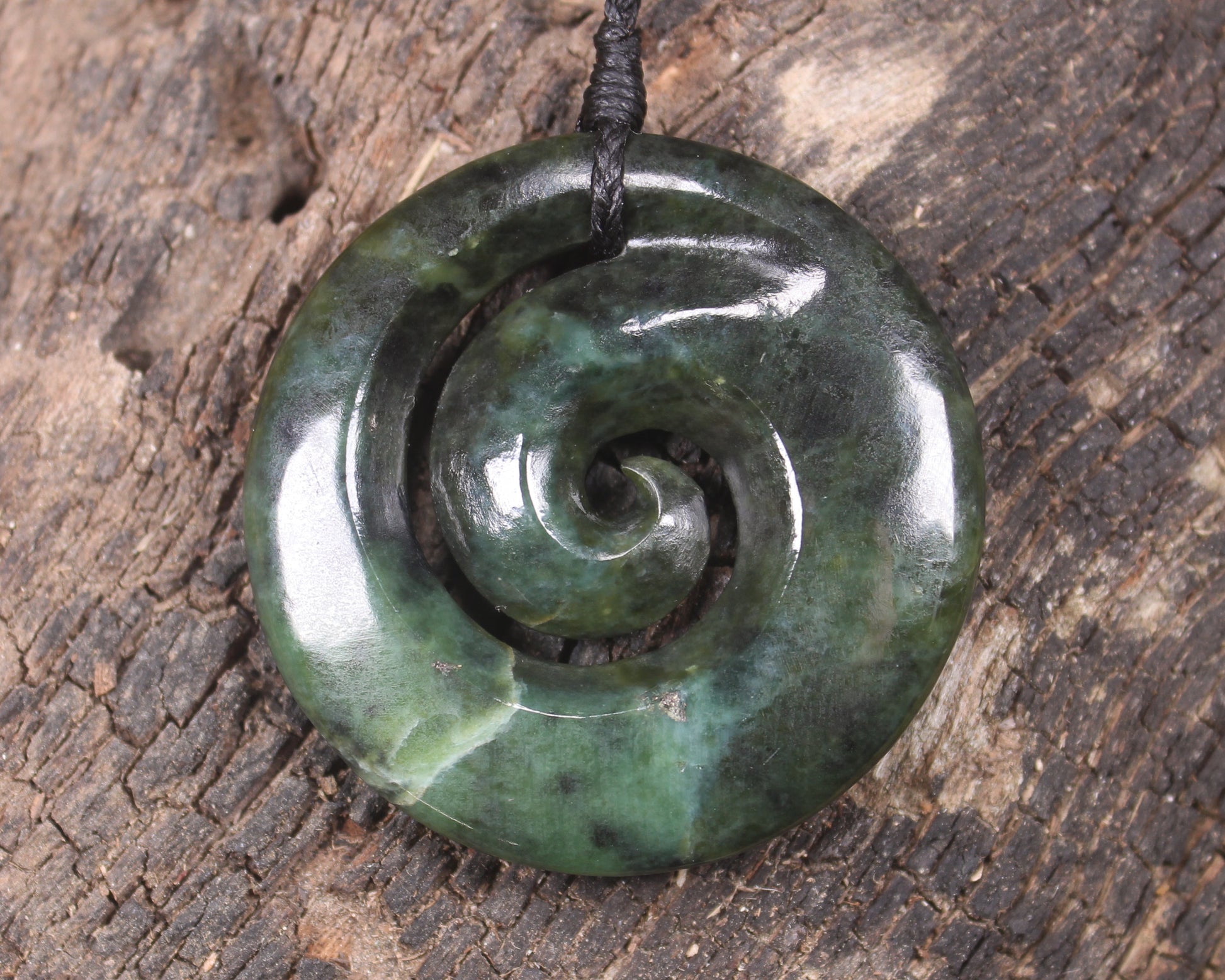 Koru carved from Inanga Pounamu - NZ Greenstone