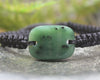 Adjustable cord bracelet with Hapopo Pounamu