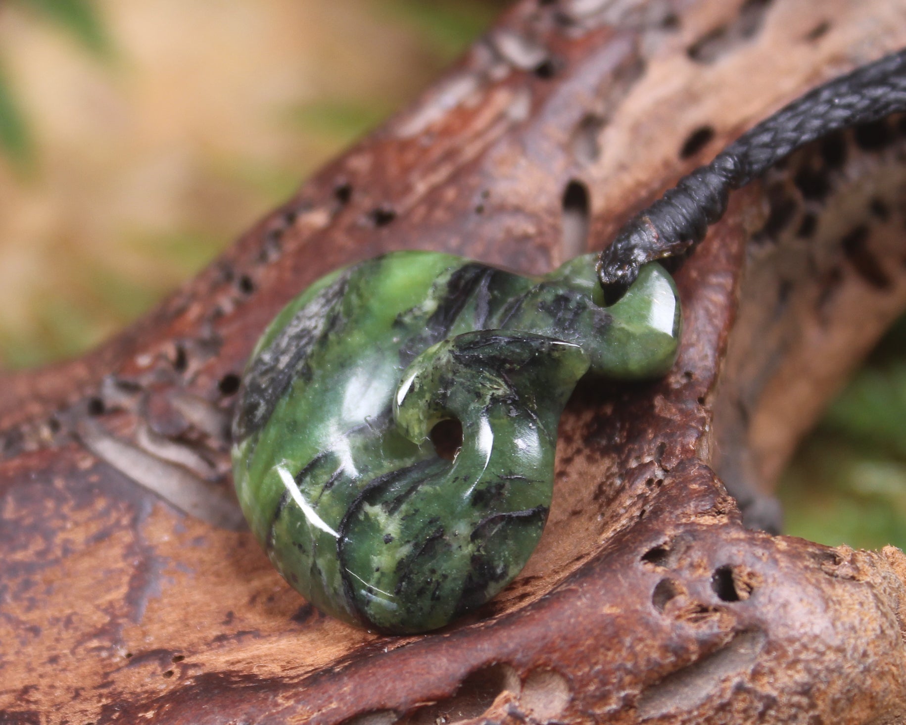 Douglas Creek pounamu hei matau pendant - NZ Greenstone