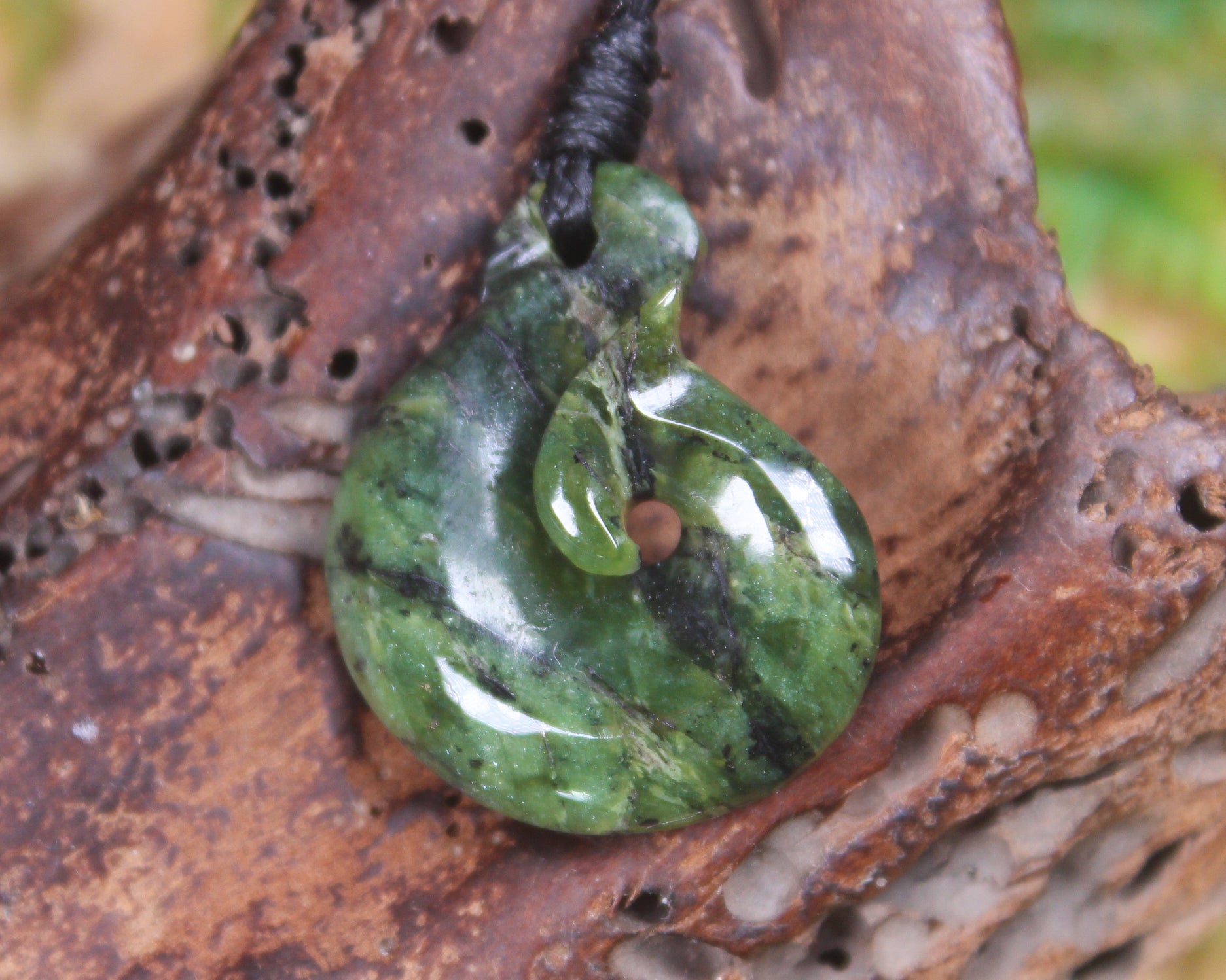 Douglas Creek pounamu hei matau pendant - NZ Greenstone