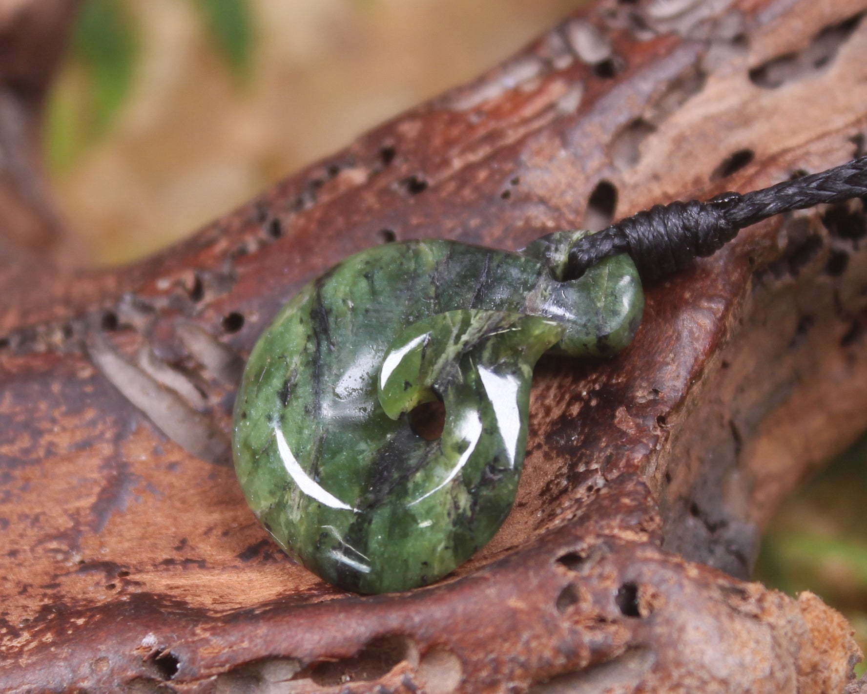 Douglas Creek pounamu hei matau pendant - NZ Greenstone