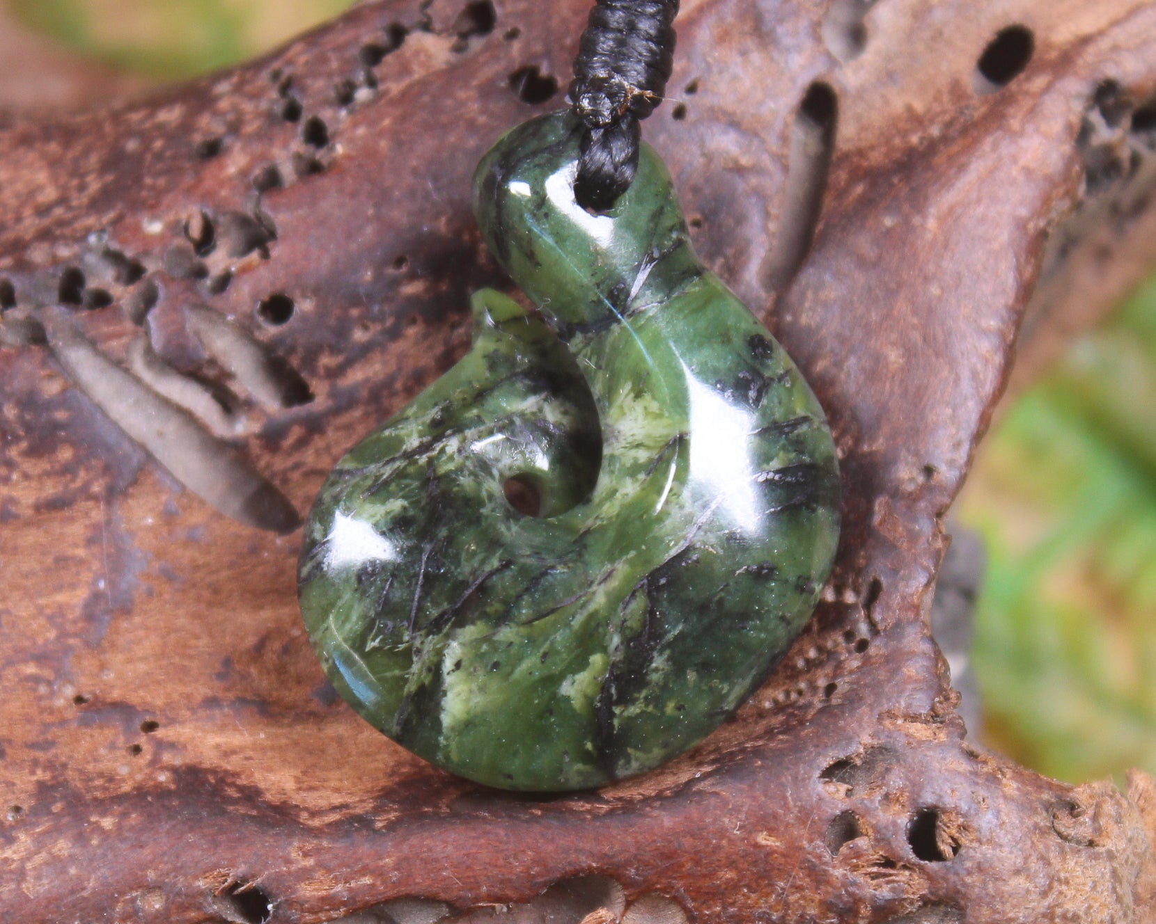 Douglas Creek pounamu hei matau pendant - NZ Greenstone