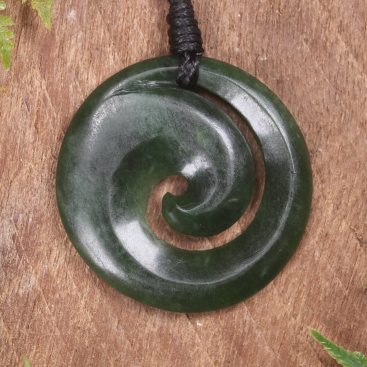 Koru pendant carved from Kawakawa Pounamu - NZ Greenstone