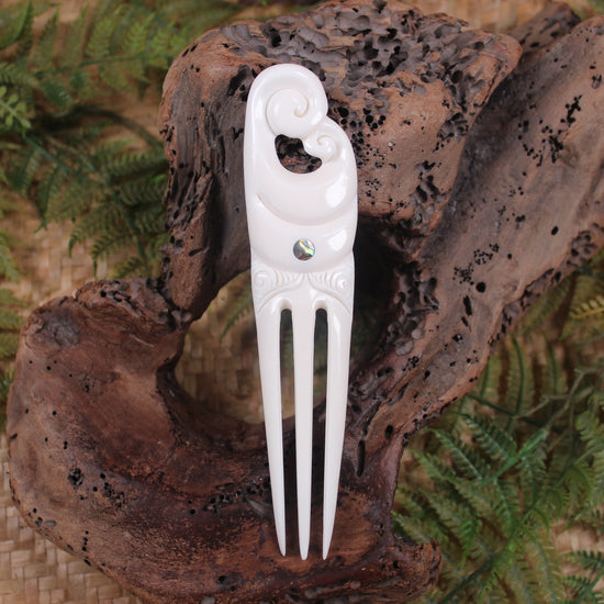 Heru with Koru carved from beef bone