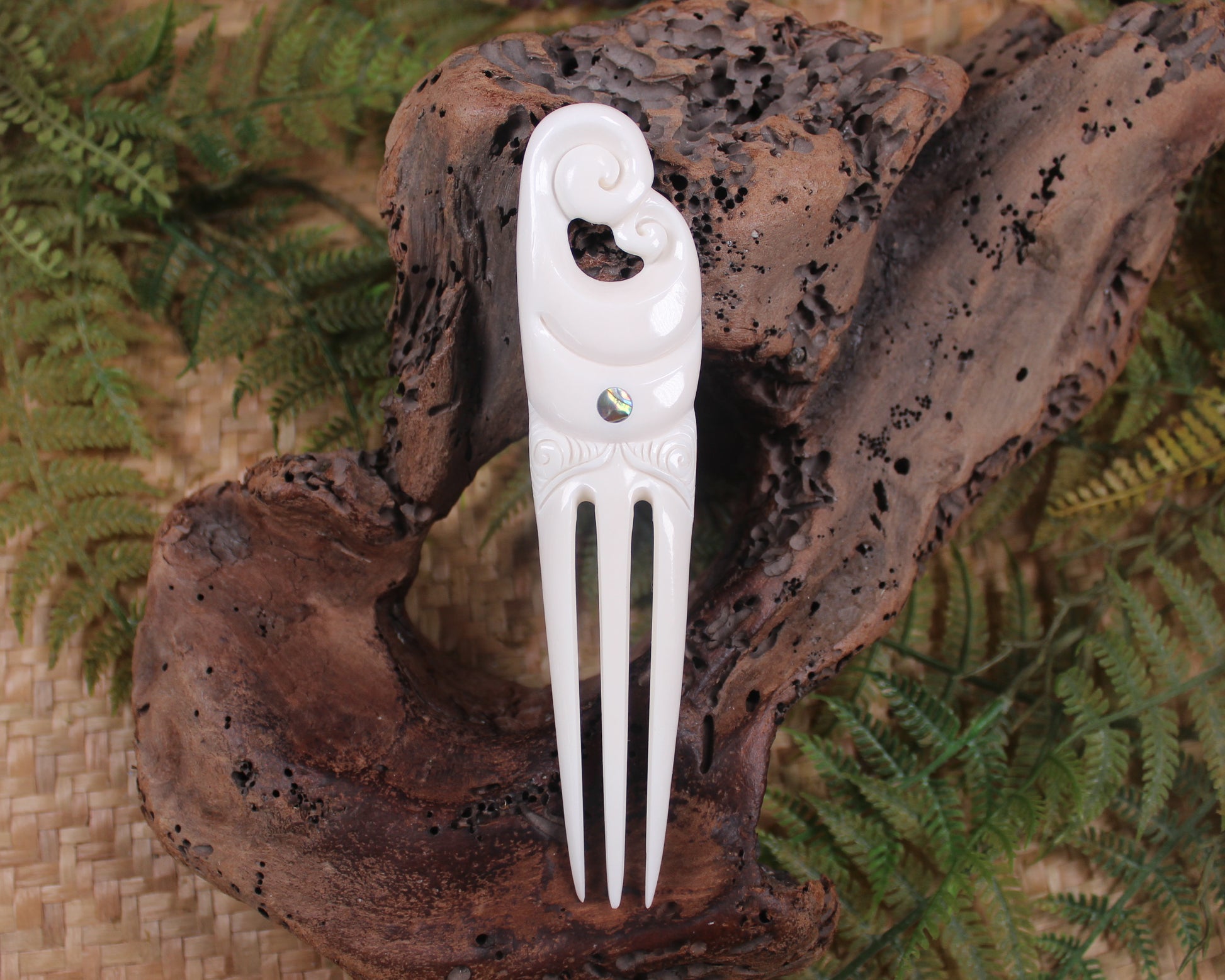 Heru with Koru carved from beef bone