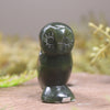 Pounamu owl sculpture