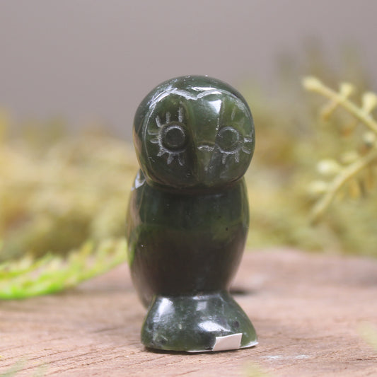 Pounamu owl sculpture