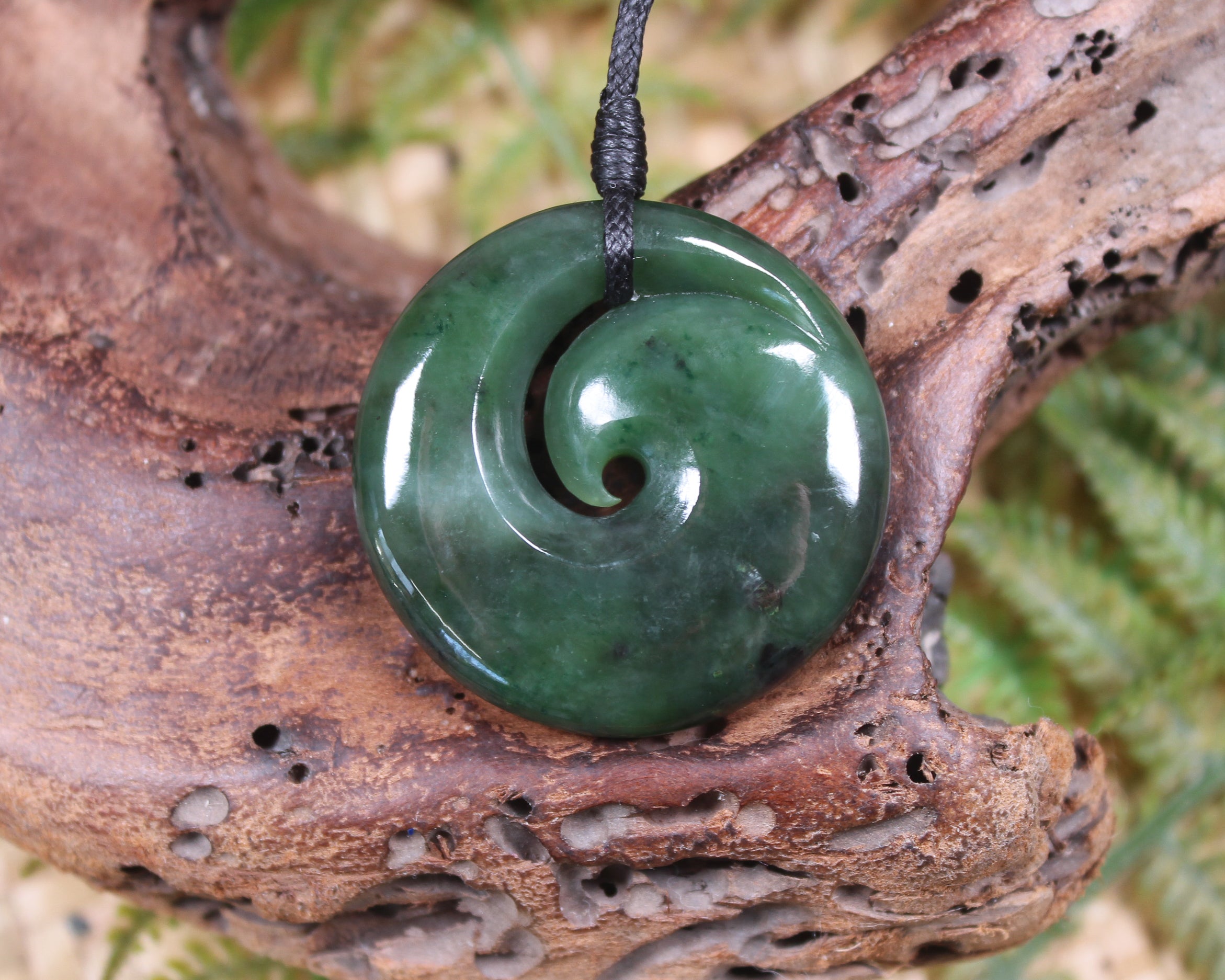 Koru carved from Rimu Pounamu - NZ Greenstone