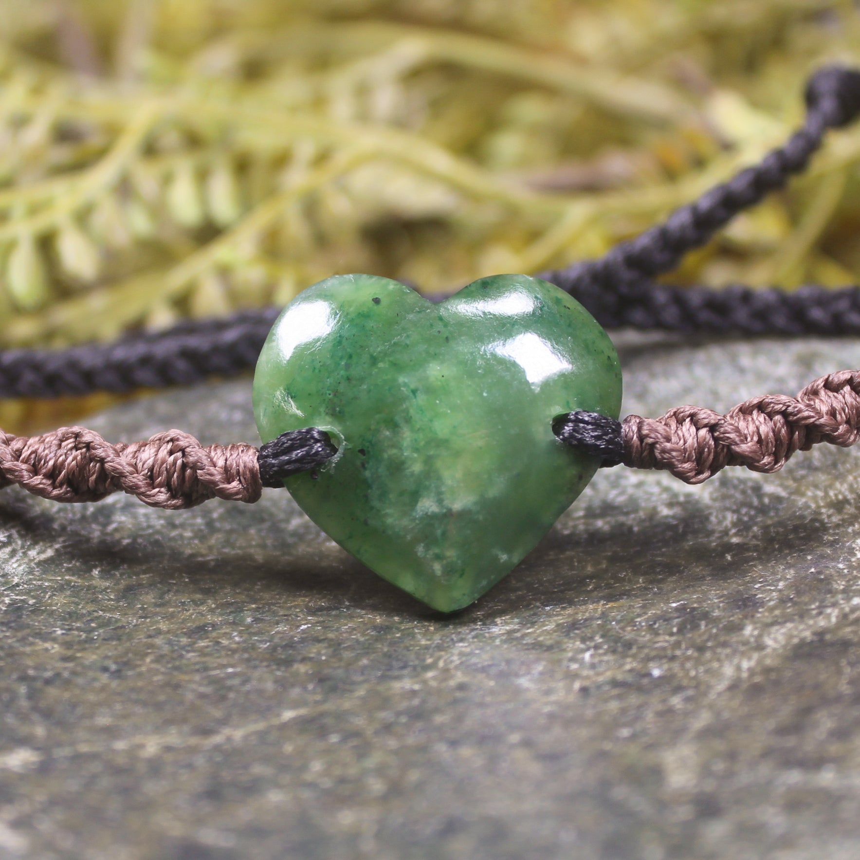 Adjustable cord bracelet with Kawakawa Pounamu
