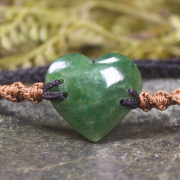 Adjustable cord bracelet with Kawakawa Pounamu