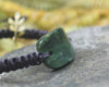 Adjustable cord bracelet with Kawakawa Pounamu