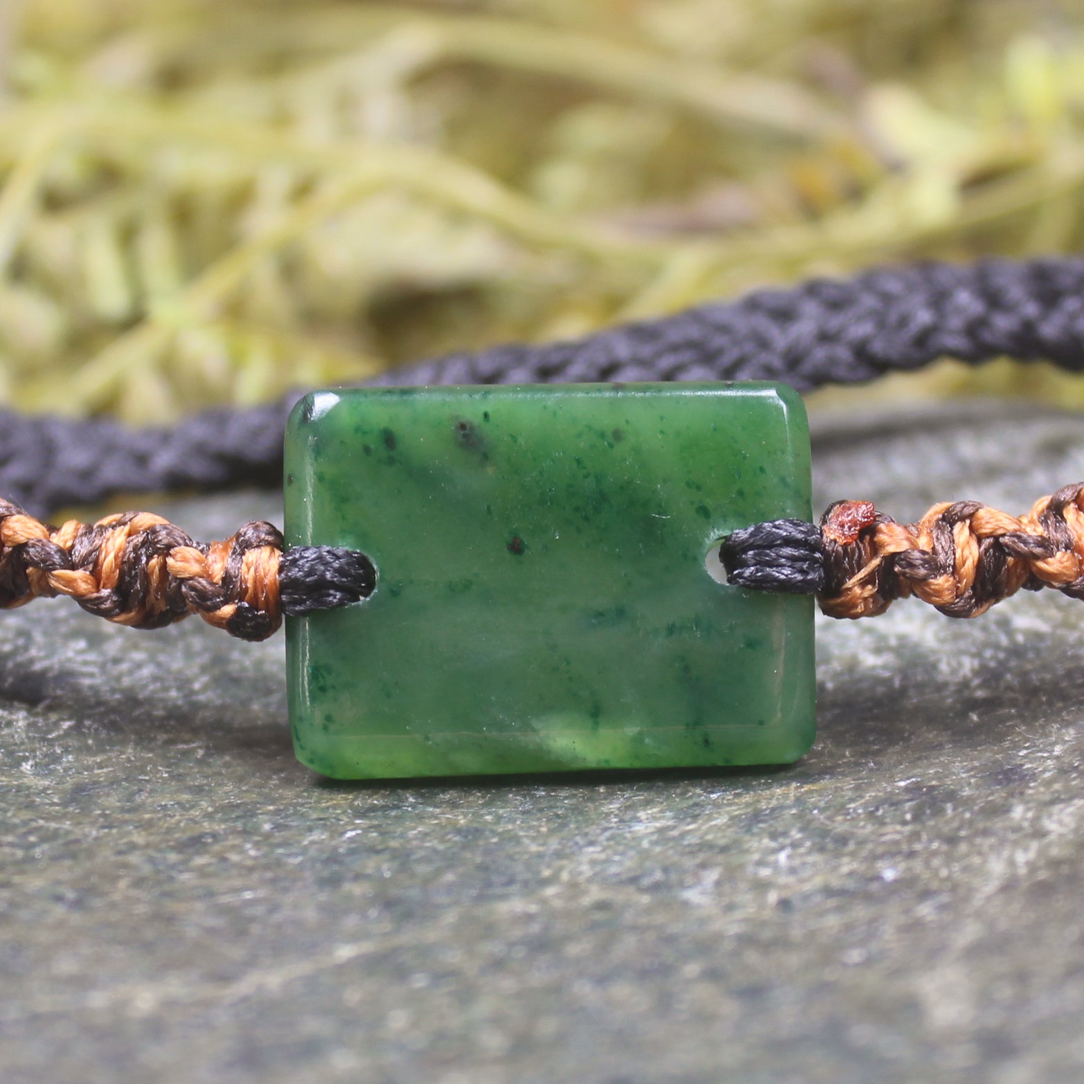 Adjustable cord bracelet with Kawakawa Pounamu