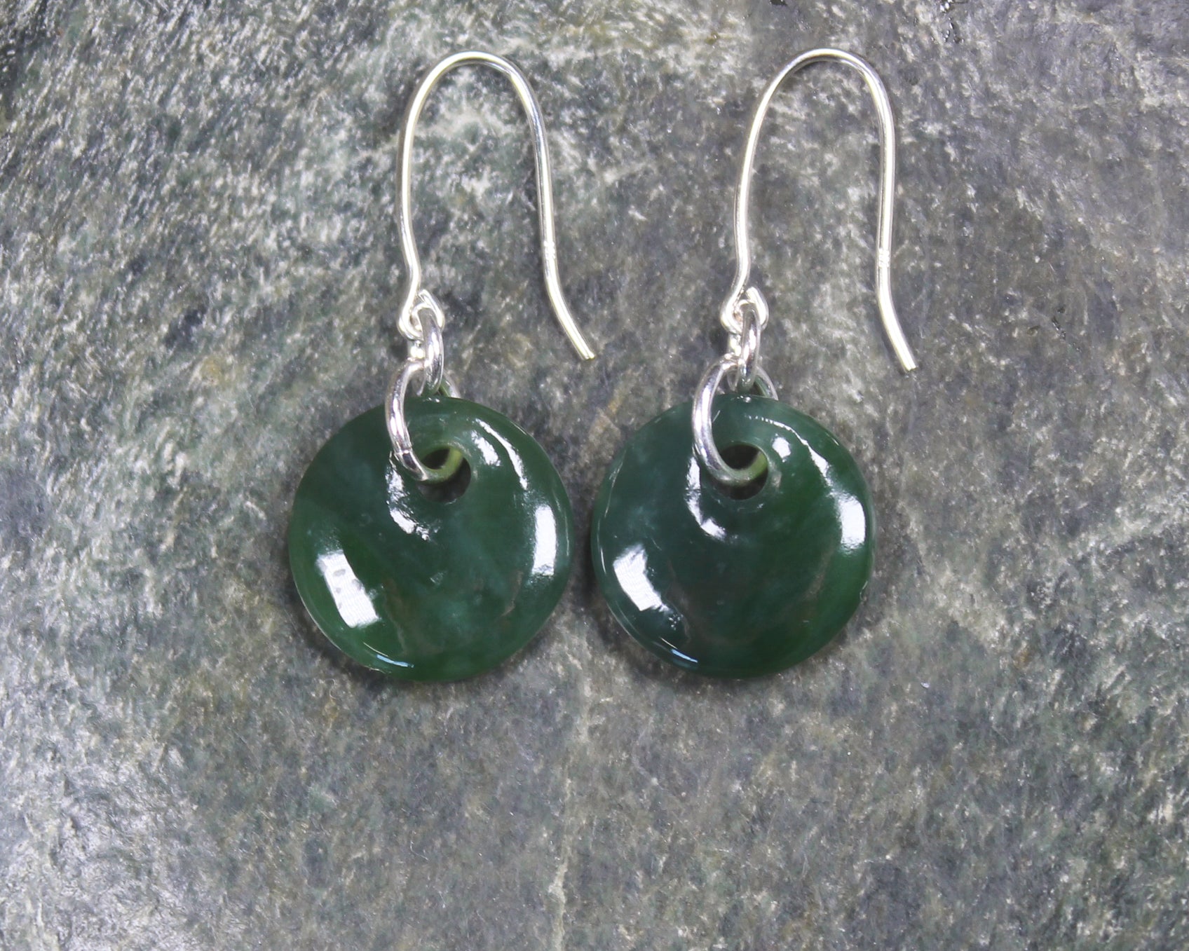 Porowhita Earrings carved from Kawakawa Pounamu - NZ Greenstone