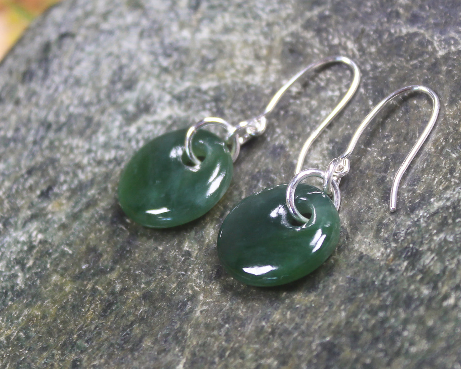 Porowhita Earrings carved from Kawakawa Pounamu - NZ Greenstone