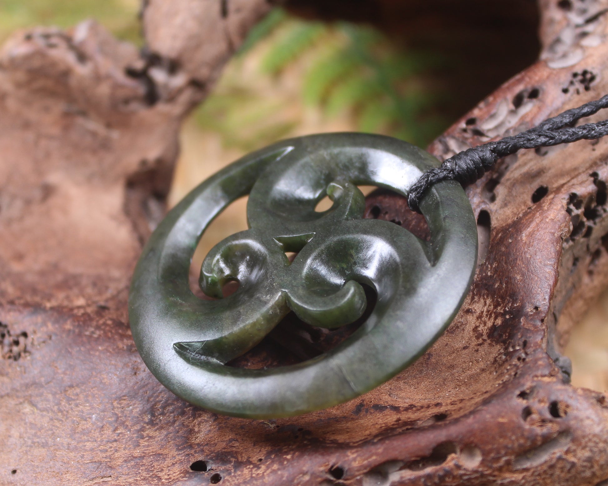 Koru carved from Rimu Pounamu - NZ Greenstone