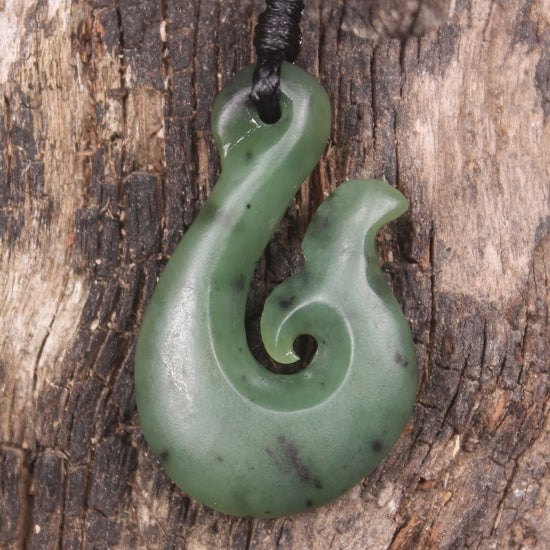 Whale tail carved from Hapopo Pounamu - NZ Greenstone