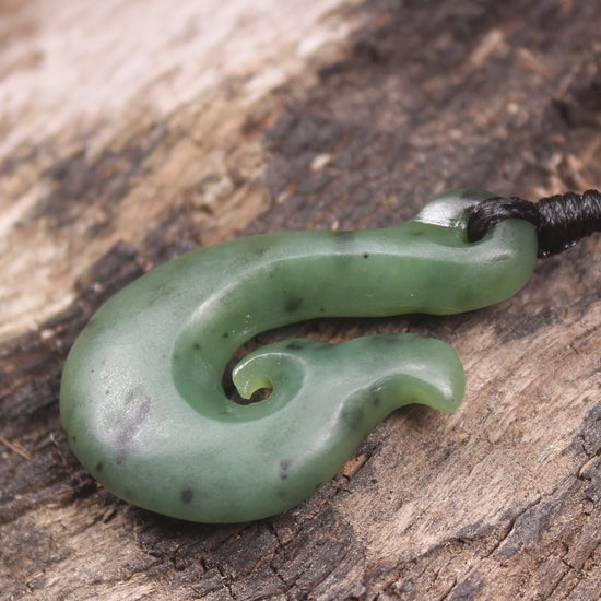 Whale tail carved from Hapopo Pounamu - NZ Greenstone