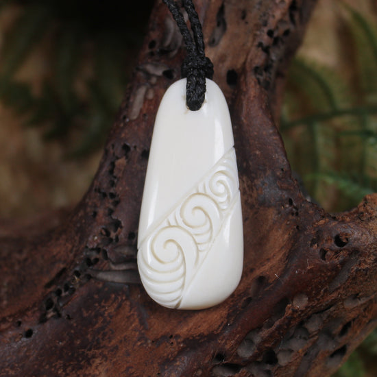 Roimata with Koru carved from beef bone