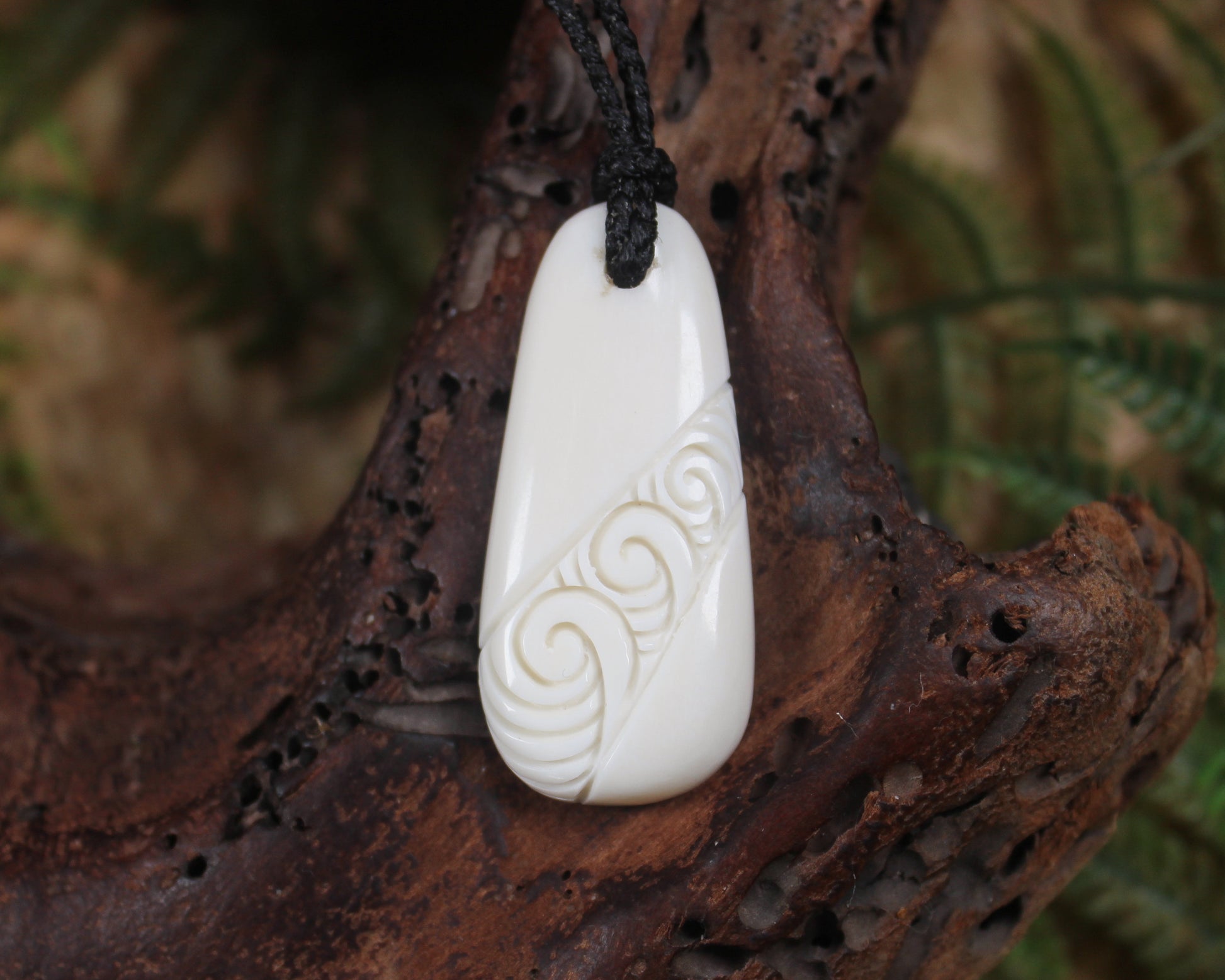 Roimata with Koru carved from beef bone