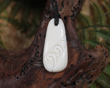 Roimata with Koru carved from beef bone