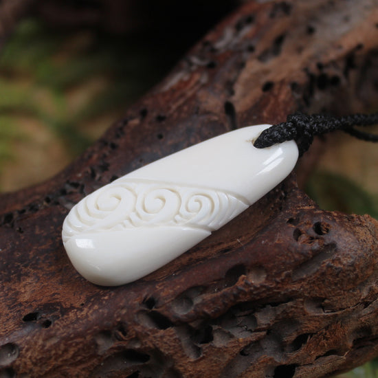 Roimata with Koru carved from beef bone