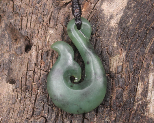 Whale tail carved from Hapopo Pounamu - NZ Greenstone