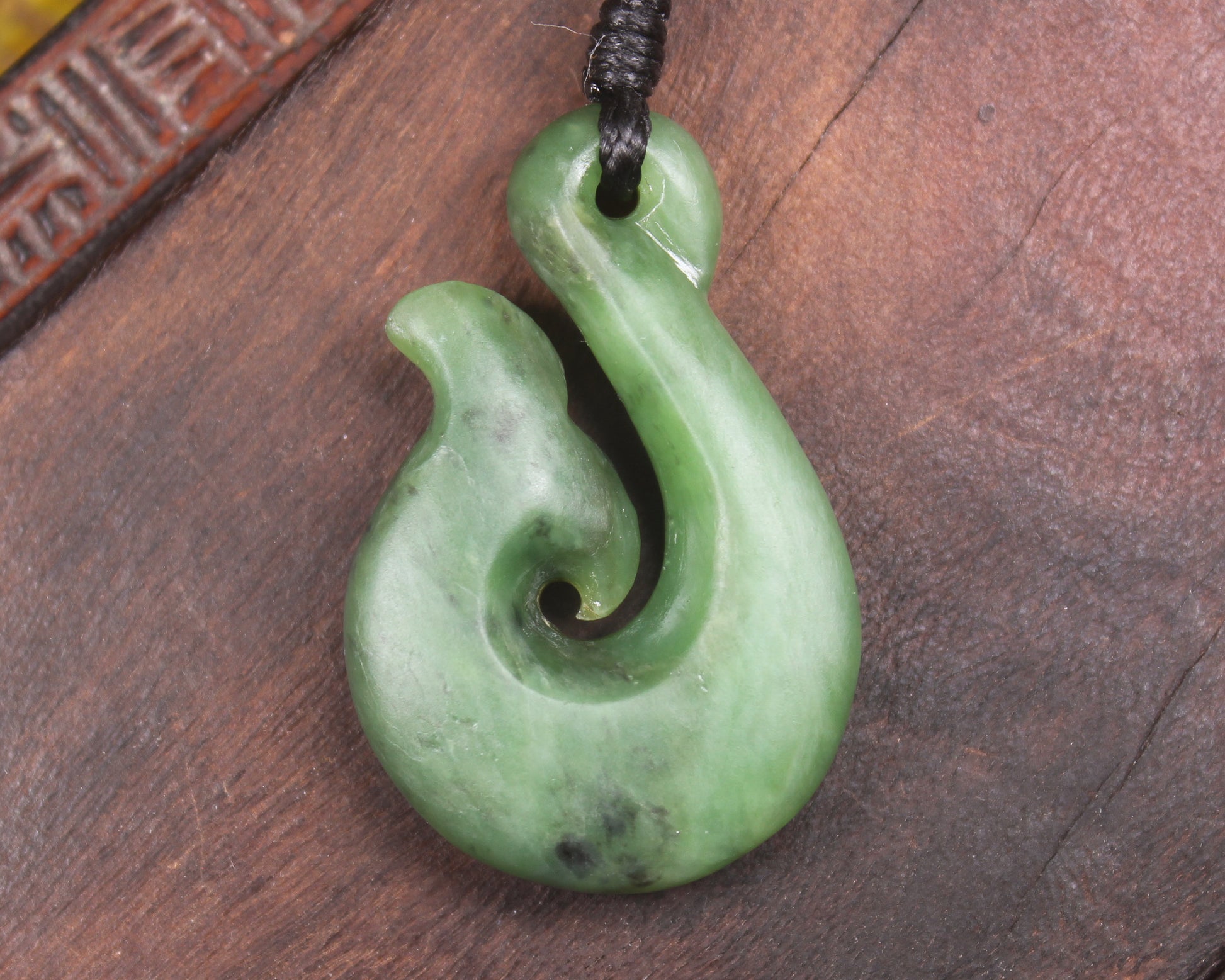 Whale tail carved from Hapopo Pounamu - NZ Greenstone